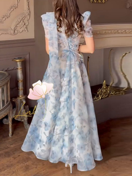 Elegant fitted printed dress with puff sleeves