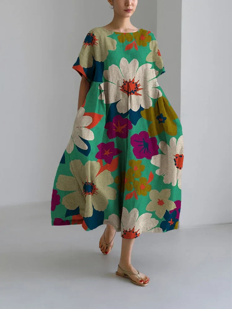 VITTORIA | Robe midi fleurie au style audacieux et au confort léger pour des journées dynamiques 