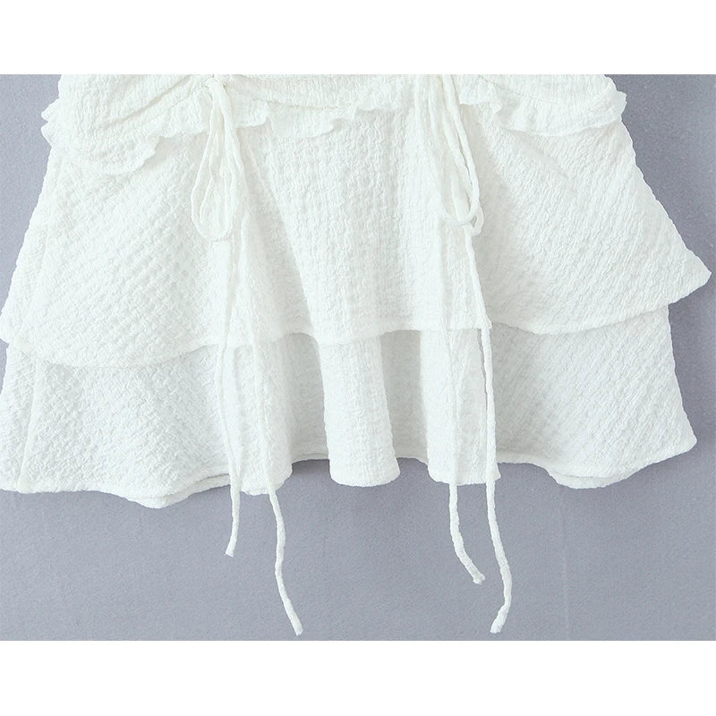 BRIGITTE RUCHED MINI DRESS