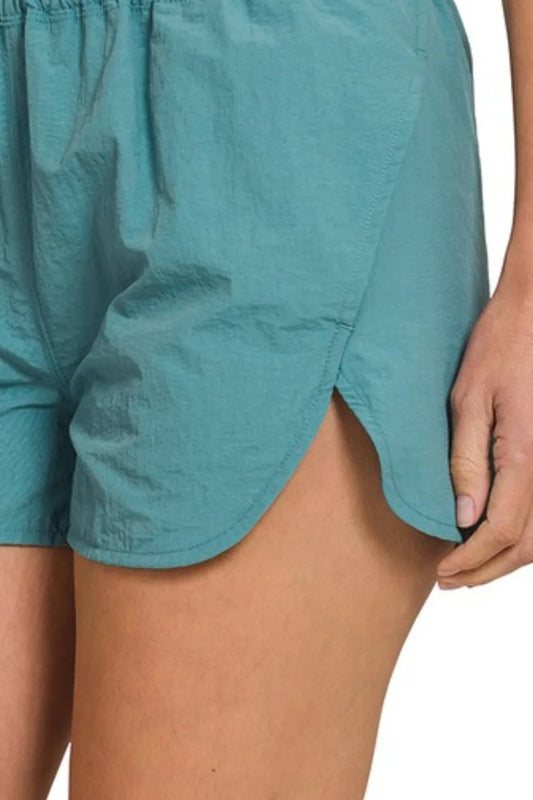 BreezeFit Smocked Waist Windbreaker Shorts – Dusty Teal
