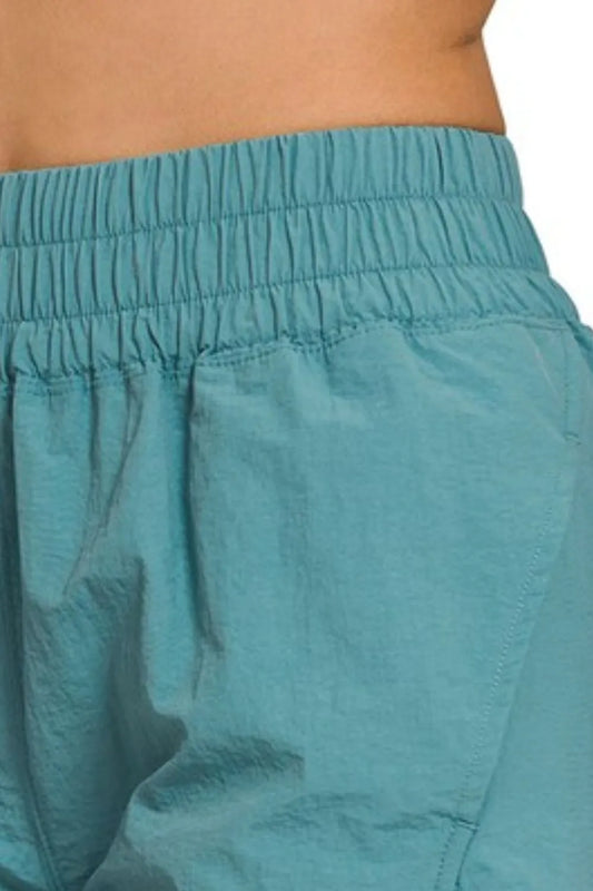 BreezeFit Smocked Waist Windbreaker Shorts – Dusty Teal