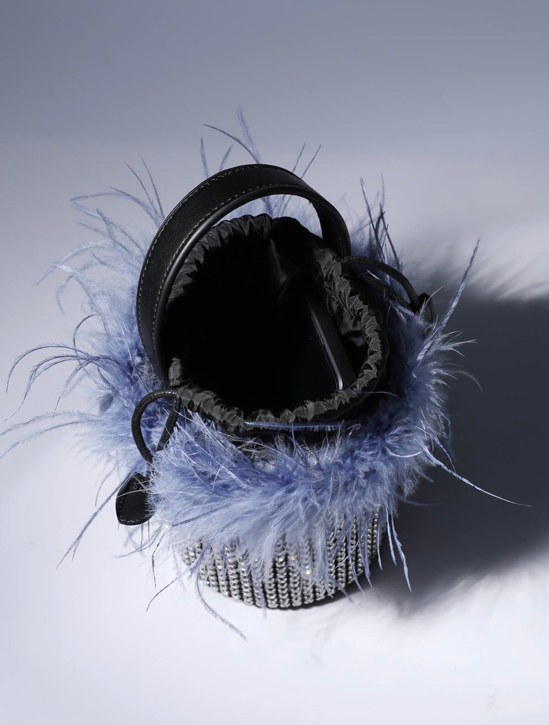 Della feather bag
