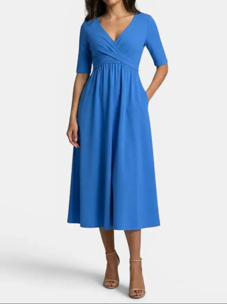 Margot — Smooth Midi Dress With Flattering Wrap Style And Practical Pockets Light blue